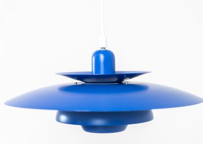 Colorful pendant light by EL-Light (Denmark, 1970s). This striking lamp showcases a minimalist, timeless design from the 1970s. Composed of four aluminum shades, the fixture is lacquered in a vivid, still original, blue color. The lamp is restored, rewired and in remarkably good condition!