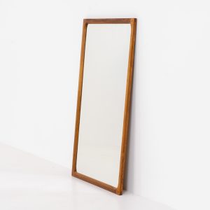 Stunning “No.166” wall mirror in rosewood by Kai Kristiansen for Aksel Kjersgaard (Denmark, 1960s). A beautifully crafted piece made by Denmark’s most renowned mirror makers, Aksel Kjersgaard. The frame, made out of solid Santos rosewood, has a warm and mesmerizing woodgrain and very nice details. In very good condition. Marked by maker.