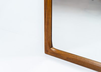 Stunning “No.166” wall mirror in rosewood by Kai Kristiansen for Aksel Kjersgaard (Denmark, 1960s). A beautifully crafted piece made by Denmark’s most renowned mirror makers, Aksel Kjersgaard. The frame, made out of solid Santos rosewood, has a warm and mesmerizing woodgrain and very nice details. In very good condition. Marked by maker.
