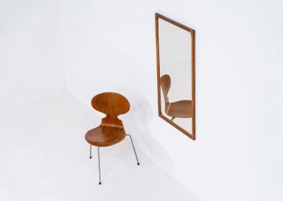 Stunning “No.166” wall mirror in rosewood by Kai Kristiansen for Aksel Kjersgaard (Denmark, 1960s). A beautifully crafted piece made by Denmark’s most renowned mirror makers, Aksel Kjersgaard. The frame, made out of solid Santos rosewood, has a warm and mesmerizing woodgrain and very nice details. In very good condition. Marked by maker.