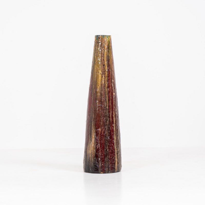 XL “Fat Lava” ceramic floor vase (Germany, 1960s). This impressive multicolored vase features beautiful textures and vibrant colors, finished with a glossy glaze that enhances its unique surface. The vase is in very good condition.