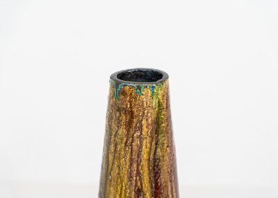 XL “Fat Lava” ceramic floor vase (Germany, 1960s). This impressive multicolored vase features beautiful textures and vibrant colors, finished with a glossy glaze that enhances its unique surface. The vase is in very good condition.