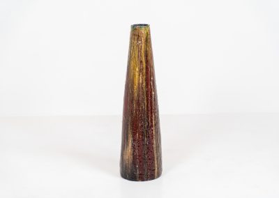 XL “Fat Lava” ceramic floor vase (Germany, 1960s). This impressive multicolored vase features beautiful textures and vibrant colors, finished with a glossy glaze that enhances its unique surface. The vase is in very good condition.