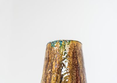 XL “Fat Lava” ceramic floor vase (Germany, 1960s). This impressive multicolored vase features beautiful textures and vibrant colors, finished with a glossy glaze that enhances its unique surface. The vase is in very good condition.