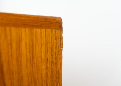 Stunning sideboard with glass doors by CFC Silkeborg (Denmark, 1960s). This elegant mid-century piece, crafted in teak, features beautifully rounded edges, sleek glass sliding doors, and refined wooden handles. Its timeless design combines style with functionality, offering lots of storage space with two adjustable shelves inside. Notably versatile, the sideboard includes three wall mounts on the back, allowing it to be used as a floating sideboard if desired. The legs can be easily removed for this purpose. In very good condition, with only two small repair marks.