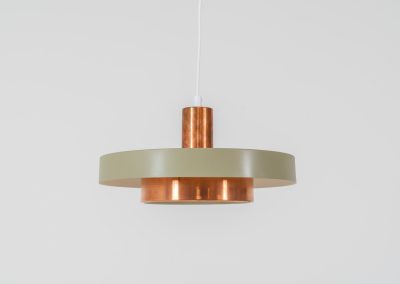 Danish pendant light 1960s. This Danish pendant light from the 1960s features a stunning combination of a copper shade and an olive green lacquered aluminum shade. The copper has a beautiful patina due to its age. The lamp is in very good condition, with a small scuff on the lacquer at the top.