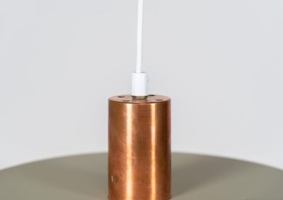 Danish pendant light 1960s. This Danish pendant light from the 1960s features a stunning combination of a copper shade and an olive green lacquered aluminum shade. The copper has a beautiful patina due to its age. The lamp is in very good condition, with a small scuff on the lacquer at the top.