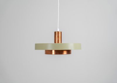 Danish pendant light 1960s. This Danish pendant light from the 1960s features a stunning combination of a copper shade and an olive green lacquered aluminum shade. The copper has a beautiful patina due to its age. The lamp is in very good condition, with a small scuff on the lacquer at the top.
