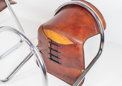 Set of 4 rare leather dining chairs by Willy Rizzo for Metaform (the Netherlands, 1970s). Designed in Italy and manufactured in the Netherlands, these hard to find chairs are a testament to Willy Rizzo’s iconic style. They feature chrome tubular frames and cognac leather seats. The leather showcases a rich patina with visible signs of use, adding character and charm to these remarkable pieces.