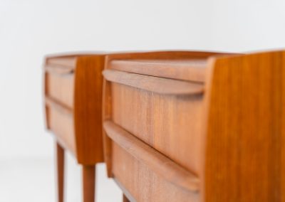 Pair of Mid-century nightstands (Denmark, 1960s). These elegant nightstands are made out of teak and both have two drawers with nice organic handles on them. Both in very good condition with minor using traces.