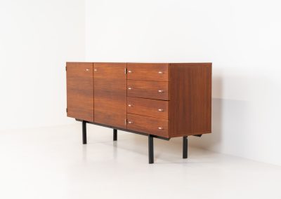Modernist “1864” sideboard by Pierre Guariche for Meurop (Belgium, 1950s). A beautiful example of Belgian modernism! It features a warm meranti woodgrain, a sleek black lacquered metal frame and aluminium handles. It remains in very good vintage condition with some minor restoration Marks, shown on the pictures.