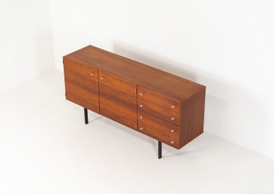 Modernist “1864” sideboard by Pierre Guariche for Meurop (Belgium, 1950s). A beautiful example of Belgian modernism! It features a warm meranti woodgrain, a sleek black lacquered metal frame and aluminium handles. It remains in very good vintage condition with some minor restoration Marks, shown on the pictures.