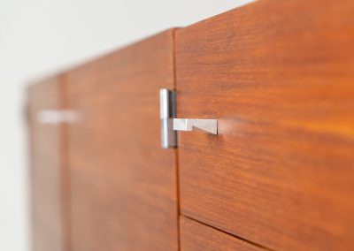 Modernist “1864” sideboard by Pierre Guariche for Meurop (Belgium, 1950s). A beautiful example of Belgian modernism! It features a warm meranti woodgrain, a sleek black lacquered metal frame and aluminium handles. It remains in very good vintage condition with some minor restoration Marks, shown on the pictures.