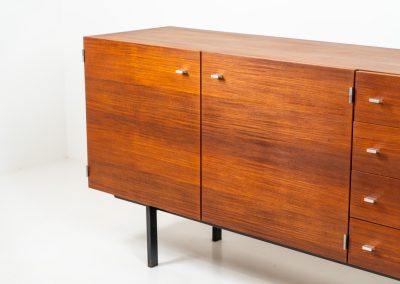 Modernist “1864” sideboard by Pierre Guariche for Meurop (Belgium, 1950s). A beautiful example of Belgian modernism! It features a warm meranti woodgrain, a sleek black lacquered metal frame and aluminium handles. It remains in very good vintage condition with some minor restoration Marks, shown on the pictures.