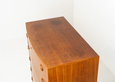 Bow front chest of drawers Kai Kristiansen (Denmark, 1960s). A very convenient and elegant piece with six drawers and nice organic sculpted handles, crafted out of teak. In good vintage condition with some visible using traces, mainly on the top. Original key included.