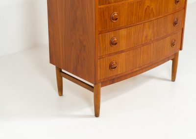 Bow front chest of drawers Kai Kristiansen (Denmark, 1960s). A very convenient and elegant piece with six drawers and nice organic sculpted handles, crafted out of teak. In good vintage condition with some visible using traces, mainly on the top. Original key included.