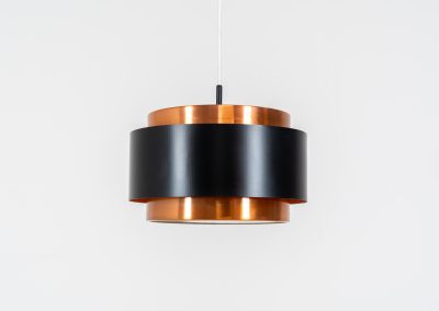 Stunning Saturn pendant light by Jo Hammerborg for Fog & Mørup (Denmark, 1960s). A stunning design with a beatutiful contrast between copper and matte black. At the top and the bottom, the lamp is closed by two acrylic plates that create an anti-dazzle and glare-free effect. A high end piece, made with quality materials. In very good condition! It features the original Fog & Mørup lable inside.