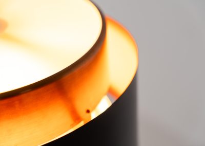 Stunning Saturn pendant light by Jo Hammerborg for Fog & Mørup (Denmark, 1960s). A stunning design with a beatutiful contrast between copper and matte black. At the top and the bottom, the lamp is closed by two acrylic plates that create an anti-dazzle and glare-free effect. A high end piece, made with quality materials. In very good condition! It features the original Fog & Mørup lable inside.