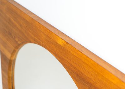 XL Mid-century mirror in solid teak (Denmark, 1960s). This stunning Danish mirror is crafted from solid teak, showcasing a bold square frame that perfectly complements the round inset mirror. A beautiful piece that adds warmth and timeless elegance to any space! The mirror remains in excellent condition. While it doesn’t currently have mounts for wall hanging, we’d be happy to arrange this upon request.