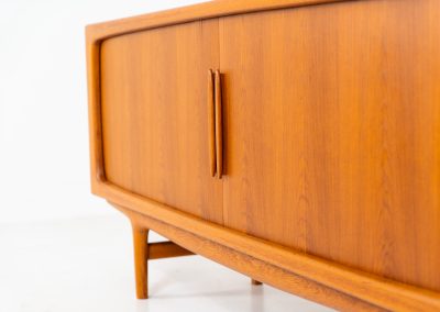 Exceptional sideboard by Johannes Andersen for CFC Silkeborg (Denmark, 1960s). Just wow.. what a piece! Clearly an example of top-notch Danish craftmanship, designed by one of Denemarks most beloved designers, Johannes Andersen. The sideboard is made out of teak and features stunning organic shapes and lots of amazing details, like the two big tambour doors and the rounded handles. This piece presents itself in mint condition with no damages or significant using traces.