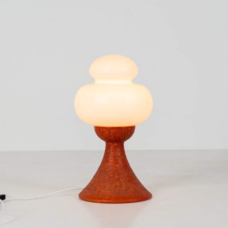 Unique ceramic Murano table lamp (Italy, 1970s). This wonderful mushroom lamp featurers an orange textured ceramic base and a nicely shaped Murano glass shade. It is newly rewired and in very good condition!