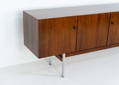 Exceptional XL sideboard in rosewood by Musterring (Germany, 1960s). A stunning modernist piece with a minimalist design, emphasizing clean lines and rich rosewood tones paired with metal legs. It features six sleek drawers and three doors with lots of storage space on the inside. The sideboard is in amazing condition.