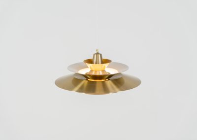 Elegant pendant light by Knud Christensen (Denmark, 1970s). A very nice lamp made of five aluminium shades in a messing color, with yellow details on the inside. It is Nelly rewired and in very good condition!
