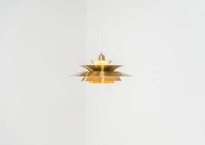 Elegant pendant light by Knud Christensen (Denmark, 1970s). A very nice lamp made of five aluminium shades in a messing color, with yellow details on the inside. It is Nelly rewired and in very good condition!