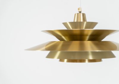 Elegant pendant light by Knud Christensen (Denmark, 1970s). A very nice lamp made of five aluminium shades in a messing color, with yellow details on the inside. It is Nelly rewired and in very good condition!