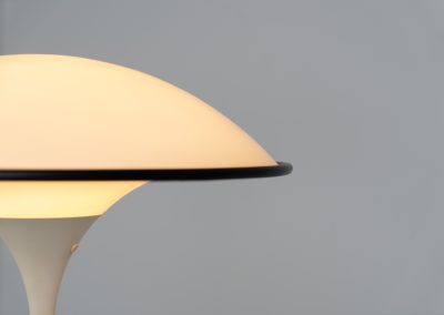 Magnificent “Cosmos” floor lamp by Preben Jacobsen for Fog & Mørup (Denmark, 1980s). This Cosos floor lamp, also know as the “Ufo” lamp features a metal tulip shaped base, a metal leg and a nicely curved acrylic dome shade that casts a beautiful, diffused glow. This sleek minimalistic piece is definitely an eye catcher. In excellent vintage condition!