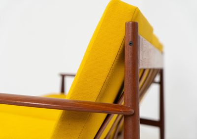 “FD-128” 3-seater by Grete Jalk for France & Son (Denmark, 1960s). This elegant masterpiece is a fine example of Scandinavian modernism. It features a solid teak frame with a warm natural grain, stunning curves and comfortable cushions, upholstered in a yellow fabric. The sofa presents itself in very good condition with only minor wear on the fabric. Labeled by maker.