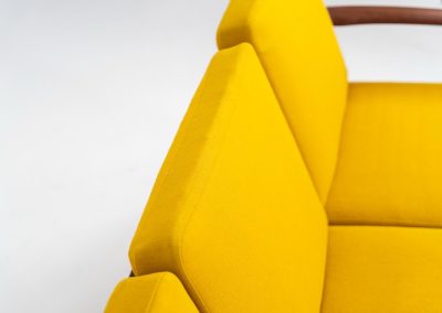 “FD-128” 3-seater by Grete Jalk for France & Son (Denmark, 1960s). This elegant masterpiece is a fine example of Scandinavian modernism. It features a solid teak frame with a warm natural grain, stunning curves and comfortable cushions, upholstered in a yellow fabric. The sofa presents itself in very good condition with only minor wear on the fabric. Labeled by maker.