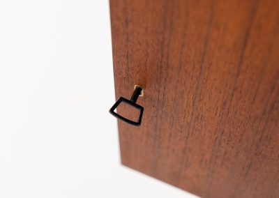 Stunning XL sideboard in teak by Bartels Werken (Germany, 1960s). A beautiful sleek sideboard featuring three doors and four drawers with beautiful inset handles. It has a warm and natural woodgrain which gives this rather minimalistic piece an elegant appearance. Its in amazing condition!