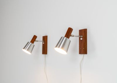 Stunning pair of Mid-century “Silva” wall lights by Lyfa (Denmark, 1960s). Each fixture features a solid teak base and cone, a sleek stainless steel adjustable arm, and a beautifully brushed aluminum lampshade. The combination of warm wood tones and cool metallic accents gives these lights a refined yet contemporary aesthetic. Both pieces are in very good condition, with only minor surface scratches on the shades. A true statement piece for any interior.