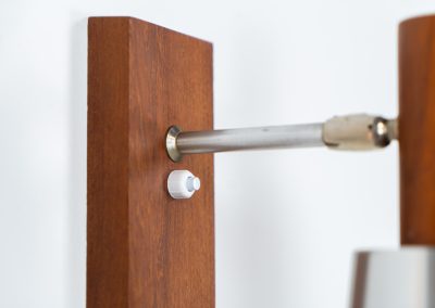 Stunning pair of Mid-century “Silva” wall lights by Lyfa (Denmark, 1960s). Each fixture features a solid teak base and cone, a sleek stainless steel adjustable arm, and a beautifully brushed aluminum lampshade. The combination of warm wood tones and cool metallic accents gives these lights a refined yet contemporary aesthetic. Both pieces are in very good condition, with only minor surface scratches on the shades. A true statement piece for any interior.