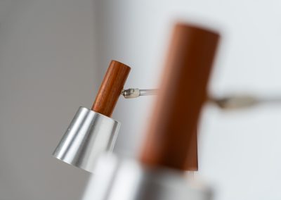 Stunning pair of Mid-century “Silva” wall lights by Lyfa (Denmark, 1960s). Each fixture features a solid teak base and cone, a sleek stainless steel adjustable arm, and a beautifully brushed aluminum lampshade. The combination of warm wood tones and cool metallic accents gives these lights a refined yet contemporary aesthetic. Both pieces are in very good condition, with only minor surface scratches on the shades. A true statement piece for any interior.