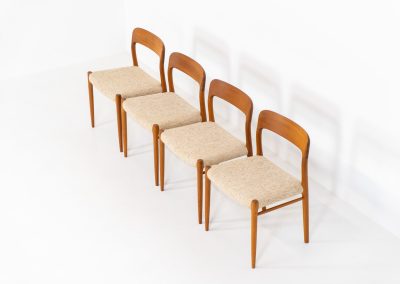 Set of 4 “Model 75” dining chairs by Niels Otto Møller for J.L. Møller (Denmark, 1960s). These iconic chairs are made out of a solid teak frame and upholstered in the original beige wool fabric. The combination of the sculptural and organic shapes combined with the natural woodgrain and the contrasting fabric makes this one hell of a chair! In very good condition and labeled by maker.