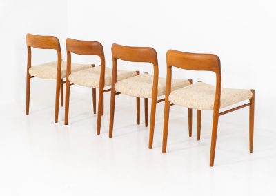 Set of 4 “Model 75” dining chairs by Niels Otto Møller for J.L. Møller (Denmark, 1960s). These iconic chairs are made out of a solid teak frame and upholstered in the original beige wool fabric. The combination of the sculptural and organic shapes combined with the natural woodgrain and the contrasting fabric makes this one hell of a chair! In very good condition and labeled by maker.