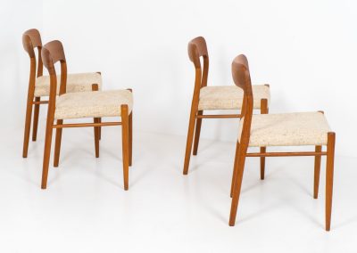 Set of 4 “Model 75” dining chairs by Niels Otto Møller for J.L. Møller (Denmark, 1960s). These iconic chairs are made out of a solid teak frame and upholstered in the original beige wool fabric. The combination of the sculptural and organic shapes combined with the natural woodgrain and the contrasting fabric makes this one hell of a chair! In very good condition and labeled by maker.