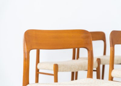 Set of 4 “Model 75” dining chairs by Niels Otto Møller for J.L. Møller (Denmark, 1960s). These iconic chairs are made out of a solid teak frame and upholstered in the original beige wool fabric. The combination of the sculptural and organic shapes combined with the natural woodgrain and the contrasting fabric makes this one hell of a chair! In very good condition and labeled by maker.