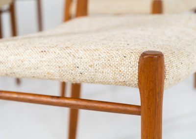 Set of 4 “Model 75” dining chairs by Niels Otto Møller for J.L. Møller (Denmark, 1960s). These iconic chairs are made out of a solid teak frame and upholstered in the original beige wool fabric. The combination of the sculptural and organic shapes combined with the natural woodgrain and the contrasting fabric makes this one hell of a chair! In very good condition and labeled by maker.