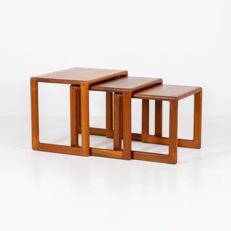 Set of 3 nesting tables in solid teak (Denmark, 1960s). The maker is unknown for now, but they are clearly built with amazing craftsmanship. They are sleek, elegant and thoughtfully designed with remarkable attention to detail. All three tables are in excellent condition.