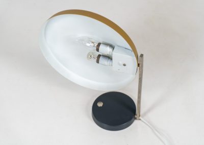 “Oslo” table lamp by H.G. Pfaender for Hildebrand (Germany, 1960s). A stunning, minimalistic and very timeless design featuring a black metal base with a built-in chrome switch, a chrome arm and an adjustable lamp shade lacquered in yellow. With the Oslo lamp, Pfaender won an ‘IF Design Award’ in 1962. The lamp is is very good condition!