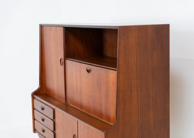 Cupboard by Louis van Teeffelen for Wébé (the Netherlands, 1960s). A typical van Teeffelen design with nicely sculpted details and organic forms. It features three drawers, an open shelve and four doors with lots of storage space on the inside. In very good condition with some visible using traces.