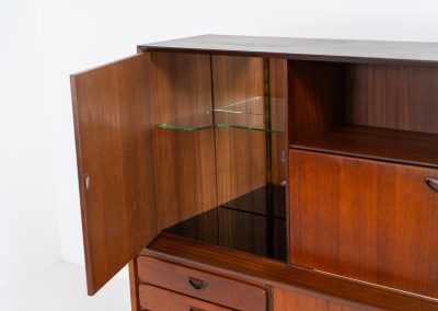 Cupboard by Louis van Teeffelen for Wébé (the Netherlands, 1960s). A typical van Teeffelen design with nicely sculpted details and organic forms. It features three drawers, an open shelve and four doors with lots of storage space on the inside. In very good condition with some visible using traces.