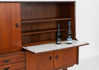 Cupboard by Louis van Teeffelen for Wébé (the Netherlands, 1960s). A typical van Teeffelen design with nicely sculpted details and organic forms. It features three drawers, an open shelve and four doors with lots of storage space on the inside. In very good condition with some visible using traces.