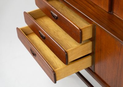 Cupboard by Louis van Teeffelen for Wébé (the Netherlands, 1960s). A typical van Teeffelen design with nicely sculpted details and organic forms. It features three drawers, an open shelve and four doors with lots of storage space on the inside. In very good condition with some visible using traces.