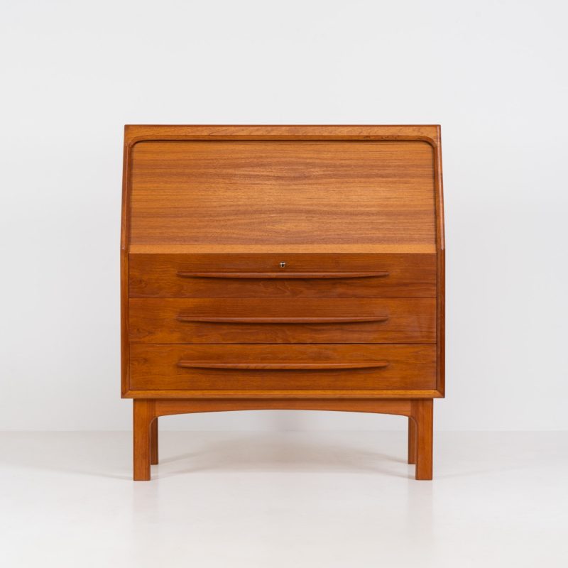 Rare secretary by Bernhard Pedersen & Søn (Denmark, 1960s). This very hard to find piece is an example of high quality Danish craftsmanship. It features stunning aesthetics and nifty details like the sculptural handles or the tambour door that opens automatically if you pull the upper drawer. It is in very good condition and marked by maker on the bottom.