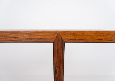 Large Rosewood coffee table by Severin Hansen for Haslev Møbelfabrik (Denmark, 1960s). A beautifully crafted coffee table made from rich rosewood, showcasing a stunning wood grain and an elegant, minimalist design. The seamless joinery between the tabletop and legs is a testament to exceptional craftsmanship and a signature technique of Severin Hansen. A timeless piece that embodies Danish modern design at its finest. It is in very good condition!