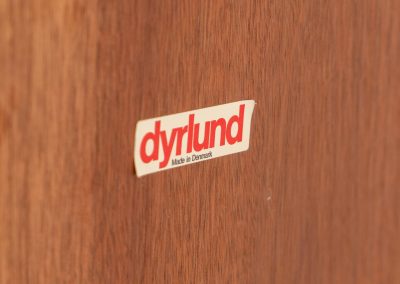 Beautiful bookcase in teak by Svend Dyrlund with tambour doors (Denmark, 1960s). This bookcase perfectly combines organic shapes and loads of detail, like the tambour sliding doors, the beautiful handles or the bulky shelves, which are adjustable in height. It offers lots of storage space! In mint condition!